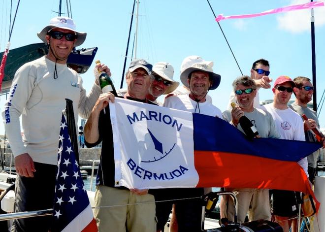 John Levinson (Center) and crew show off their Line Honors banner at the Royal Hamilton Amateur Dinghy Club. ‘Jambi’, a new Hinckley Bermuda 50 crossed the finish line off St. David’s Lighthouse at 12:47:00 ADT to take line honors in the 40th Anniversary Marion Bermuda Race.  ‘Jambi’ had an unofficial elapsed time of 4 days 22 hours 52 minutes 11 seconds. Based on her starting time of 12:55 EDT on June 9, that is 118 hours 52 minutes and 11 Seconds. © Talbot Wilson